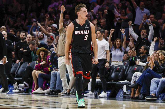 Miami Heat guard Pelle Larsson (9) reacts after sinking a three pointer late in the fourth quarter to seal the game against the Milwaukee Bucks during their NBA basketball game at Kaseya Center in Miami on March 12, 2026.